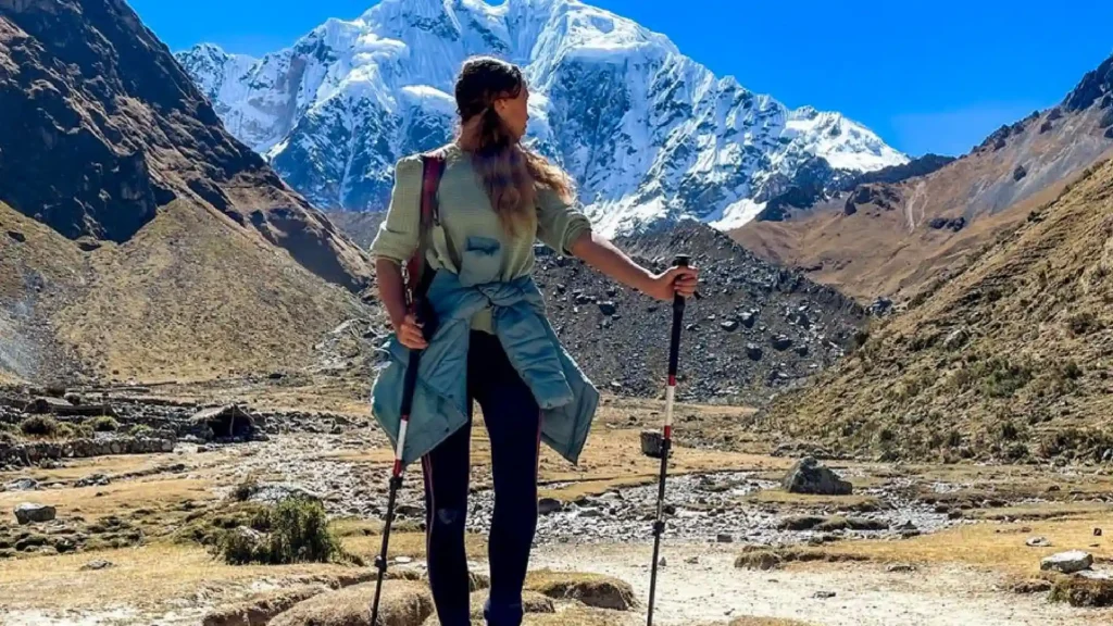 Tourist trekking on the route to Rainbow Mountain Peru